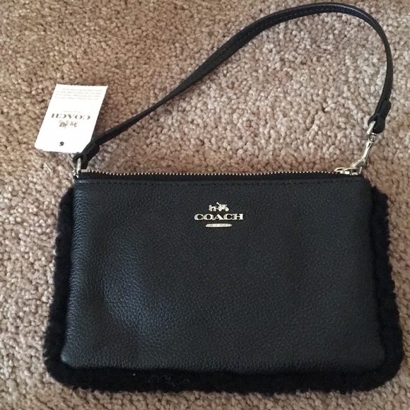 Coach Handbags - Black Coach wristlet BNWT